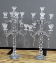 A pair of modern eight branch, nine light lustre candelabra, 63cm high