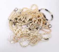 A large collection of assorted mainly freshwater pearl necklaces.
