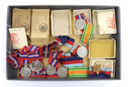 Fifteen WWII medals including some with original card boxes, including; eight War medals, three