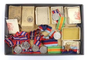 Fifteen WWII medals including some with original card boxes, including; eight War medals, three