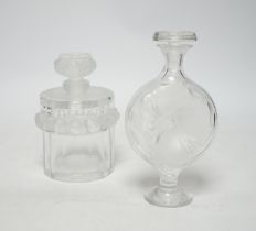 Two Lalique glass scent bottles and stoppers comprising ‘Robinson’ and ‘Moulin Rouge’, signed to the