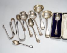 A small group of assorted silver flatware, including pair of fiddle and thread pattern sauce ladles,