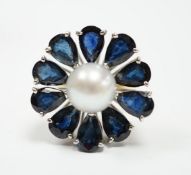 A modern large 18ct gold, single stone cultured pearl and ten stone pear cut sapphire set flower