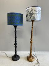 A Victorian style painted standard lamp and shade together with a giltwood standard lamp with shade,