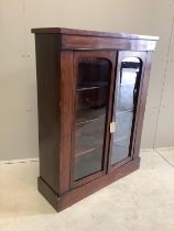 A late Victorian mahogany glazed bookcase, width 80cm, depth 29cm, height 106cm