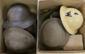 Six military etc. tin helmets. Including an example, painted as an Air Raid Warden’s helmet, with