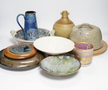 Eight studio pottery items including a cylindrical pot by Mary Rich, a Brenda Wright serving dish, a
