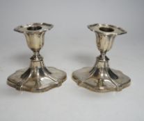 A pair of late Victorian silver mounted dwarf candlesticks, Hawksworth, Eyre & Co, Sheffield,