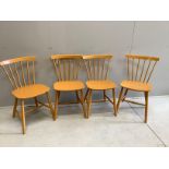 Four Danish painted beech stick back dining chairs