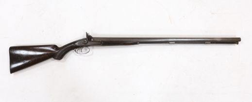 A double barrel, percussion sporting gun by F.T. Baker, half stocked, locks engraved with gundogs,