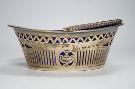 A late Victorian silver oval sugar basket, J.W. Caldicott, Birmingham, 1895, with blue glass