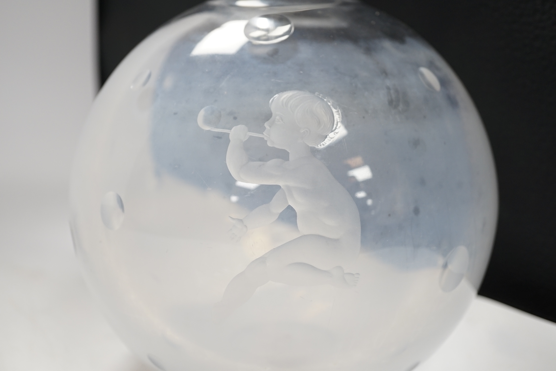 An Orrefors globular glass vase, engraved with a boy blowing bubbles, attributed to Vicke - Image 2 of 3