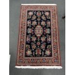 A North West Persian blue ground medallion rug, 164 x 103cm