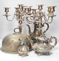 A quantity of silver plated wares to include a three piece tea set, tureen cover and pair of