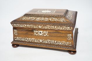 A William IV ivory inlaid rosewood work box, containing a fitted interior with lift out tray, 28.5cm