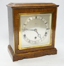 An Elliott three train mantel clock, 25cm high