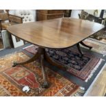 A Regency mahogany twin pillar extending dining table, 208cm extended, one spare leaf (with one