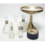 A WMF tazza, 21cm high, and five bottles, two with silver collars, and a cylindrical box