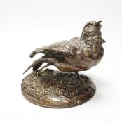After Jules Moigniez (1835-1894), a bronze study of a bird, 13cm wide