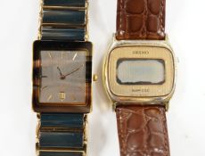 A gentleman's ceramic and gilt steel Rado Diastar wrist watch and a Seiko wrist watch.