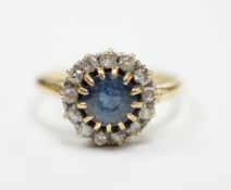 An early 20th century 18ct, sapphire and diamond set circular cluster ring, size P, gross weight 3.3