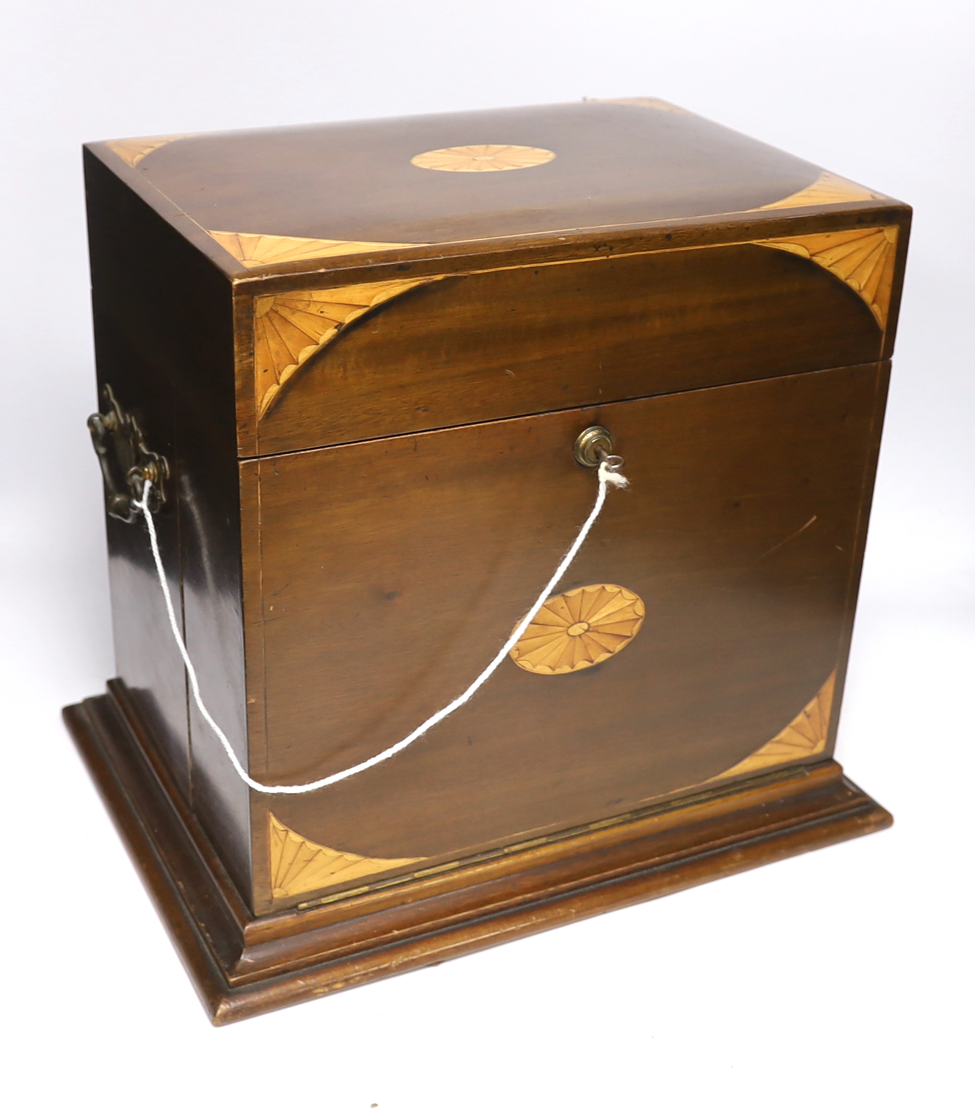 An Edwardian Sheraton revival inlaid mahogany portable drinks cabinet with tantalus and other