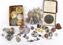 A collection of medals, cap badges, commemorative coins etc. including; a cased RMS Lusitania medal,