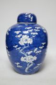 A late 19th century Chinese blue and white prunus jar and cover, 34cm high