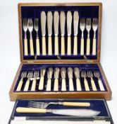 A set of twelve plated engraved fish knives and forks, with bone handles, cased together with a pair