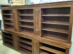 A George III style mahogany straight front library bookcase, width 350cm, depth 42cm, height 213cm