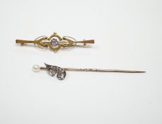An early 20th century diamond chip and seed pearl set initial stick pin, 65mm and a 9ct and gem