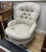 A late Victorian upholstered spoonback nursing chair, later painted legs, width 63cm, depth 72cm,