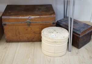 A large painted tin trunk, a smaller trunk and a cream hat tin, largest 70cm wide