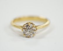 An 18ct gold and solitaire diamond set ring, size O, gross weight 3.5 grams, stone diameter