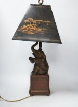 A bronzed elephant table lamp with chinoiserie shade, 65cm high