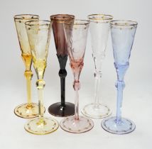 A set of six coloured Moser engraved and gilt enamelled, champagne flutes, 27cm high