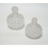 Two Lalique graduated cactus pattern glass scent bottles and stoppers, one with label to the base,