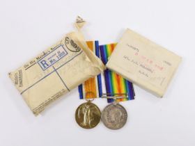 A WWI medal pair of Victory medal and British War medal, to Cpl. J.S. Rhodes A.S.C., with their