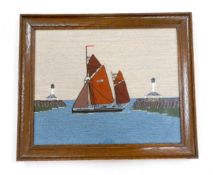 A long stitch wool work embroidery of ‘The Lowestoft Ketch Susie LT28’, in a harbour mouth, 20th