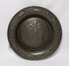 A large North European pewter 'Adam and Eve' alms dish, possibly Nuremberg 18th/19th century,