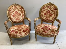A pair of Louis XVI style giltwood and composition tub framed open armchairs, width 70cm, depth