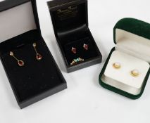 Four assorted pairs of gem set ear studs including 9ct gold and white opal and 9ct gold and garnet.