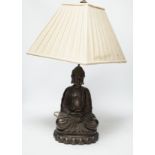 A bronzed Buddha table lamp, 57cm high including shade