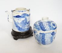 A Chinese Straits blue and white jar and cover, 19th century, a cylindrical teapot and an associated