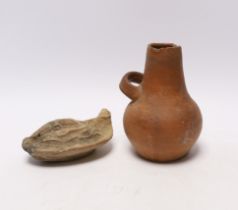 A Roman lamp, possibly 3rd century and an ancient pot, 12.5cm high