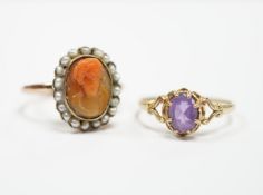 A modern 9ct gold and single stone amethyst set ring and a yellow metal, carved coral and split