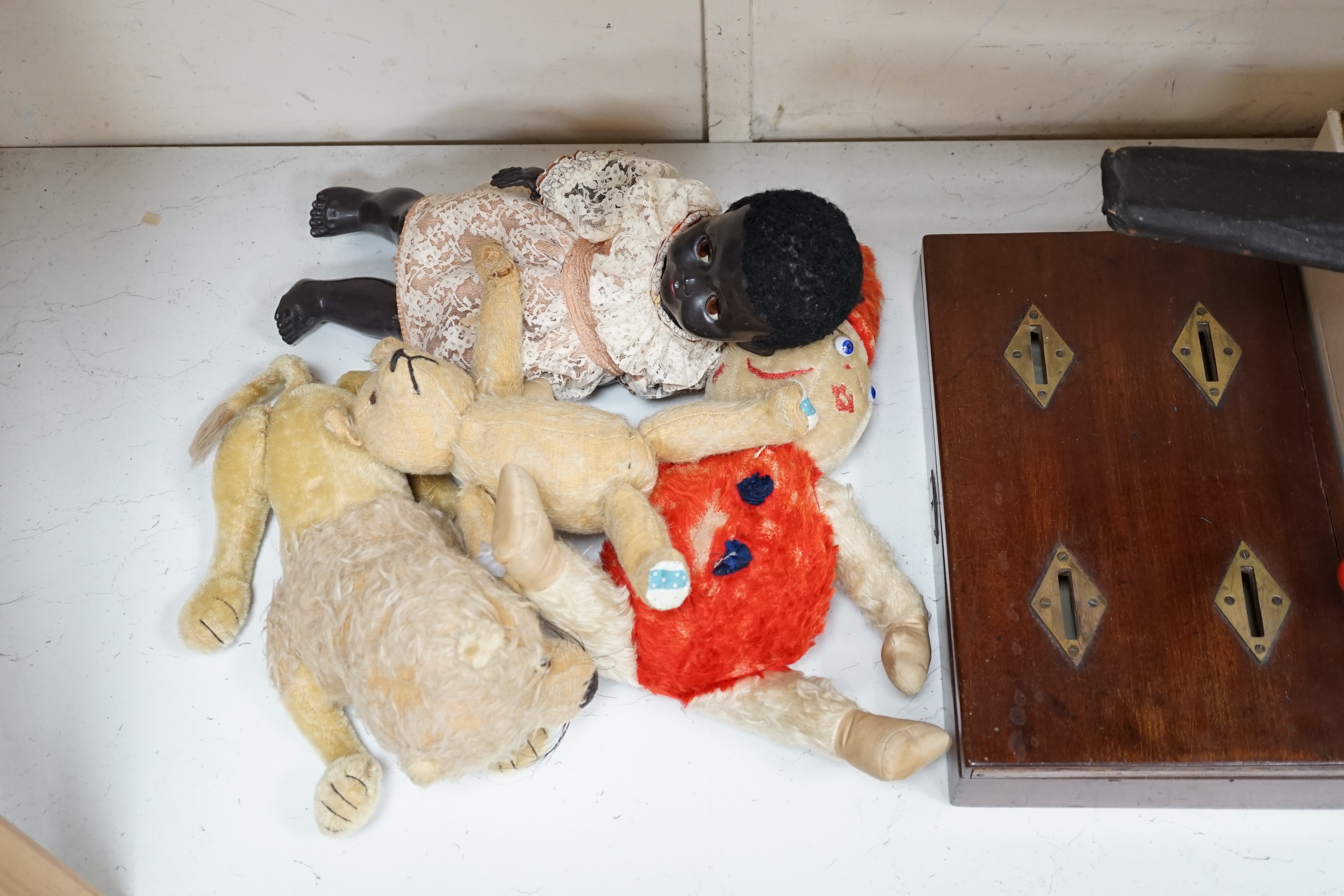 An early 20th century cased Bussey’s Hawk kite, a black walkie talkie doll, a four slot money box, - Image 7 of 8