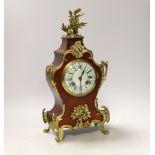 A Louis XV style tortoiseshell and ormolu mounted mantel clock with enamel Roman numeral dial,