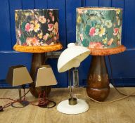 A pair of WMF bronzed metal bedside lamps, a smaller pair and a desk lamp, 36cm high