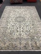 A Kashan ivory ground carpet, 284 x 195cm